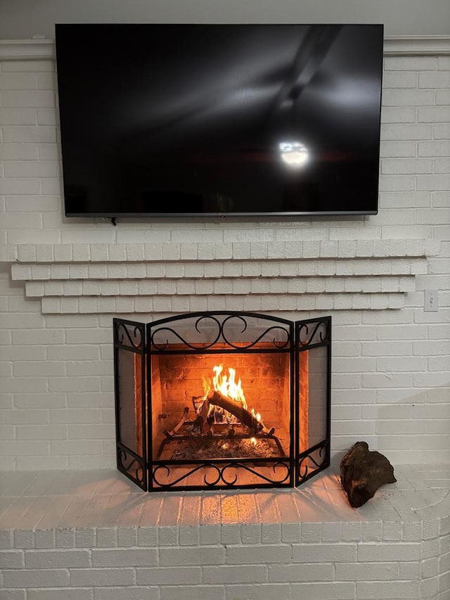 interior details featuring a fireplace