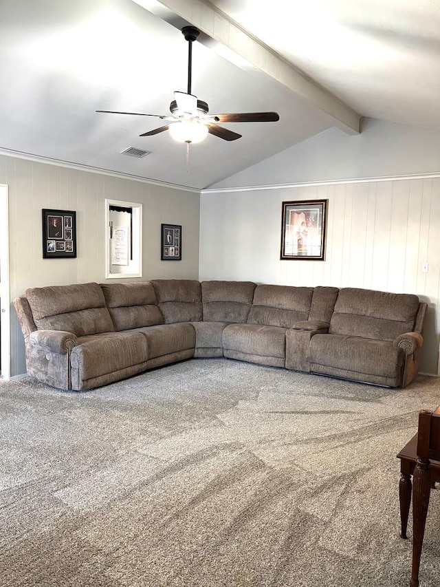 carpeted living room featuring vaulted ceiling with beams and ceiling fan