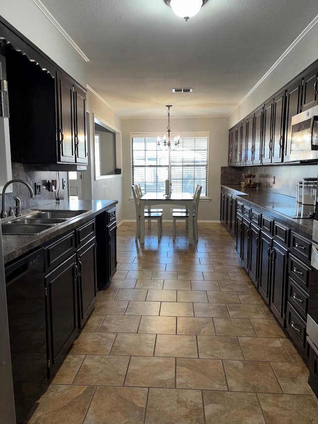 kitchen featuring decorative light fixtures, dishwasher, sink, decorative backsplash, and crown molding