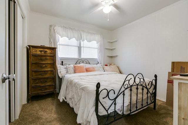 bedroom with ceiling fan, ornamental molding, and dark colored carpet