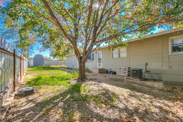 view of yard featuring central AC