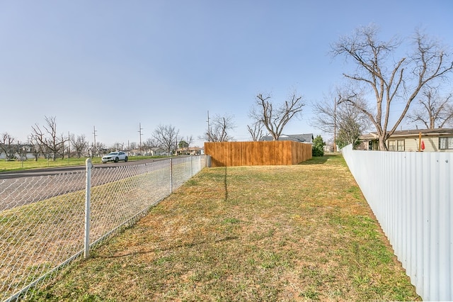 view of yard featuring fence