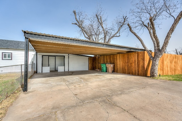 garage with fence