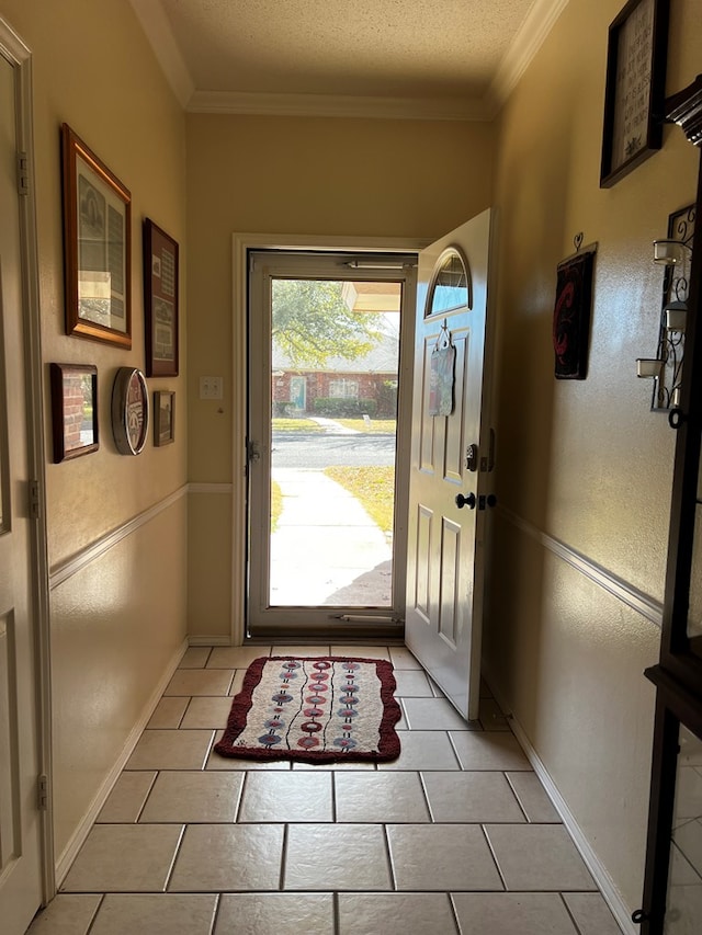 3514 Shadyhill Dr, San Angelo, TX 76904 - entryway featuring ornamental molding, baseboards, and light tile patterned floors