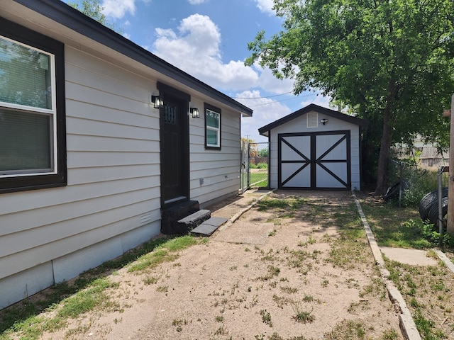 exterior space featuring a storage shed