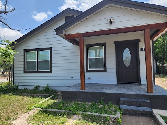 view of front of home featuring covered porch