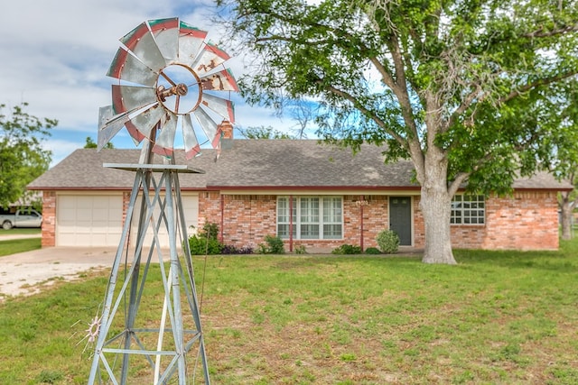 4302 Homestead Cir, Wall, TX 76903 - view of front of house featuring brick siding, concrete driveway, a front lawn, and roof with shingles