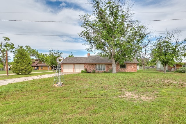 4302 Homestead Cir, Wall, TX 76903 - ranch-style home featuring an attached garage, driveway, a chimney, and brick siding