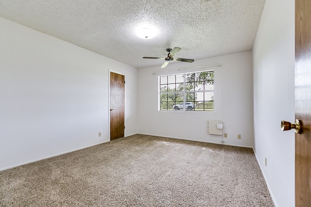 4302 Homestead Cir, Wall, TX 76903 - spare room featuring carpet flooring, a ceiling fan, a textured ceiling, and baseboards