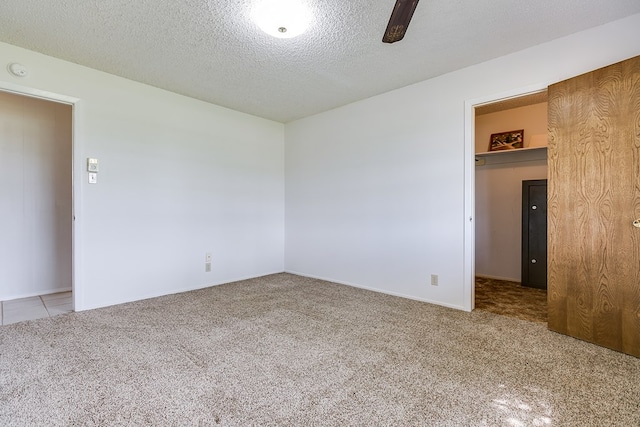 4302 Homestead Cir, Wall, TX 76903 - carpeted spare room featuring a smoke detector, a textured ceiling, and baseboards