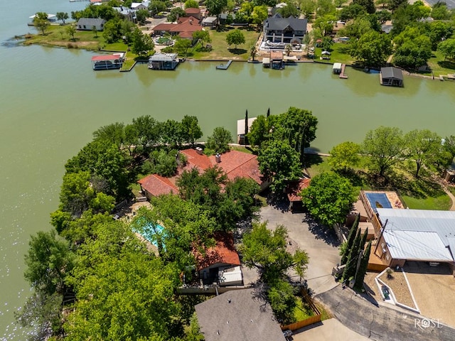 bird's eye view with a water view and a residential view
