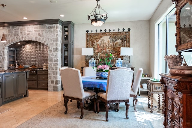 dining area featuring light tile patterned flooring