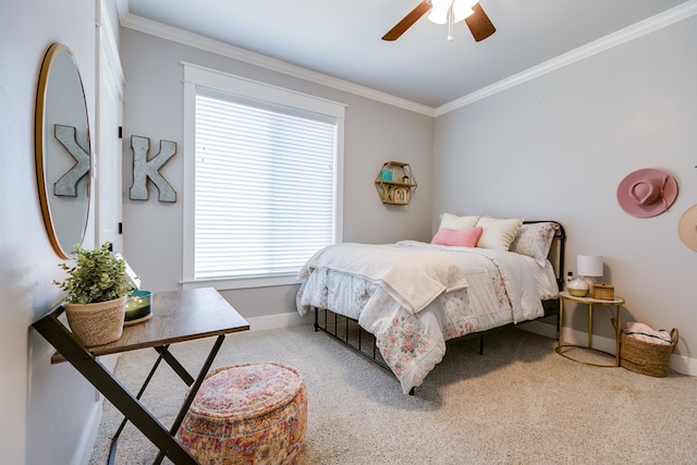 bedroom featuring baseboards, crown molding, carpet flooring, and multiple windows
