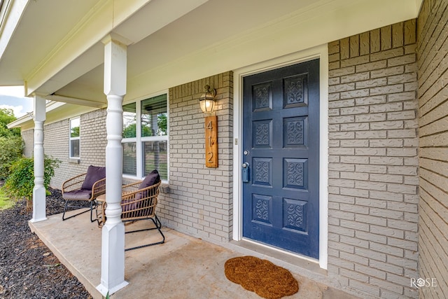 412 E Holmes Ave, Bronte, TX 76933 - entrance to property with covered porch and brick siding