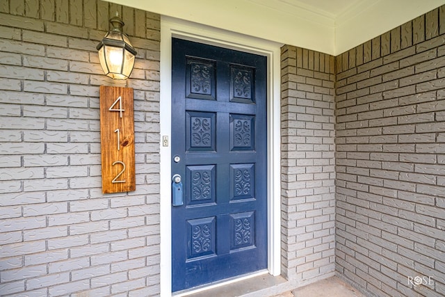 412 E Holmes Ave, Bronte, TX 76933 - doorway to property with brick siding