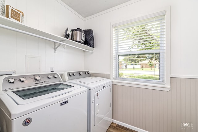 412 E Holmes Ave, Bronte, TX 76933 - washroom with washer and dryer, plenty of natural light, wood finished floors, wainscoting, and ornamental molding