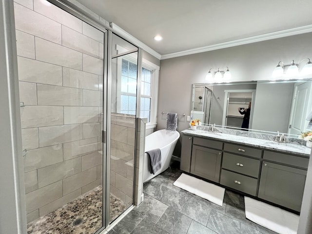 bathroom with vanity, ornamental molding, and shower with separate bathtub