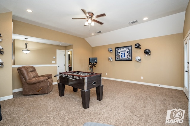 game room with vaulted ceiling, carpet, and ceiling fan