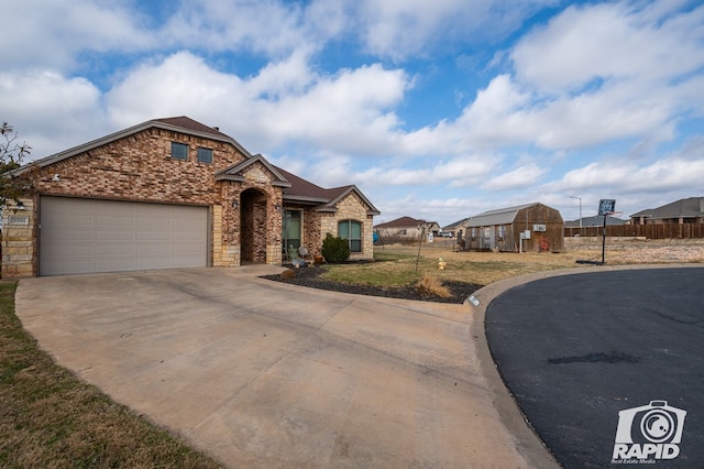 view of front of property with a garage