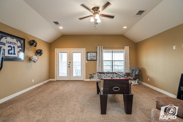 game room with french doors, ceiling fan, lofted ceiling, and carpet flooring