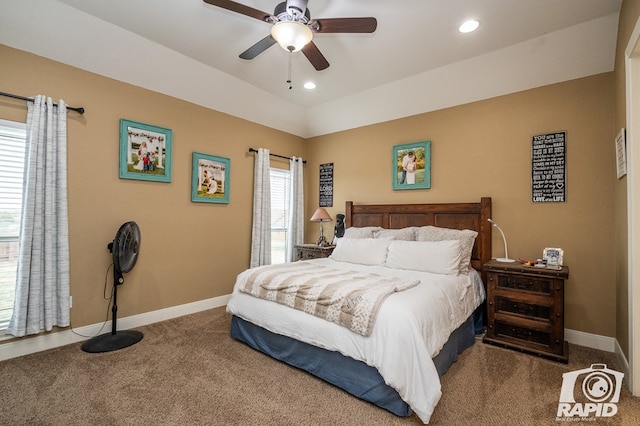 bedroom featuring vaulted ceiling, carpet flooring, and ceiling fan