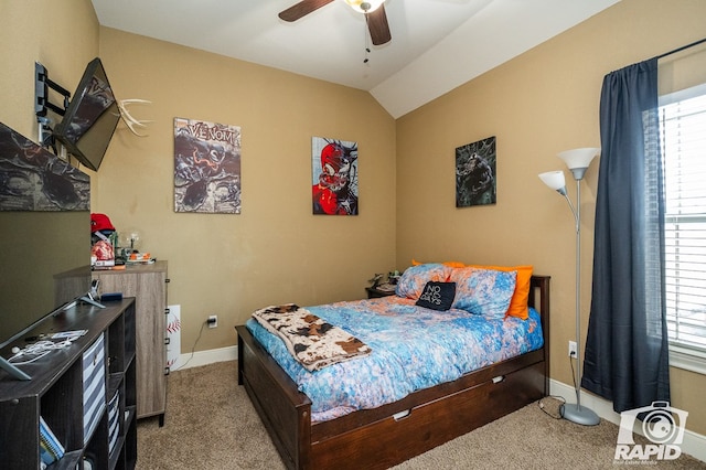 bedroom with multiple windows, carpet floors, lofted ceiling, and ceiling fan