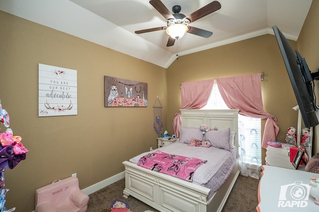 carpeted bedroom with vaulted ceiling and ceiling fan