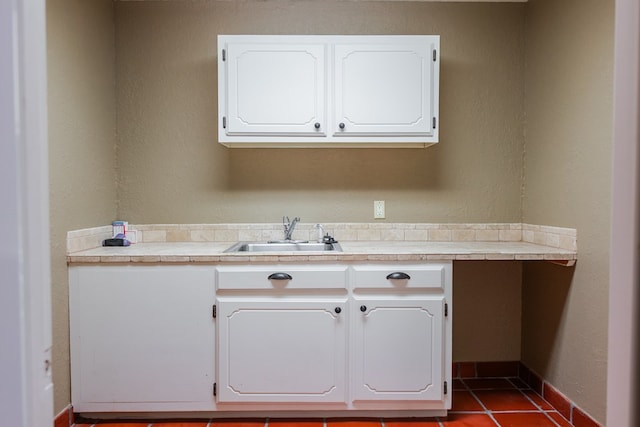 3705 Gemini Dr, San Angelo, TX 76903 - washroom with baseboards and a sink