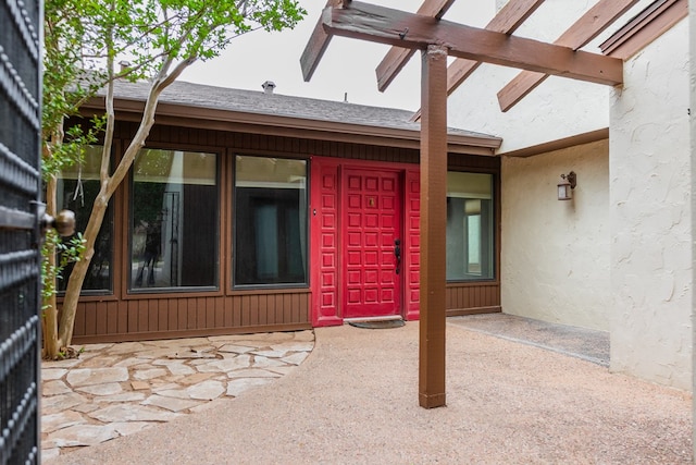3705 Gemini Dr, San Angelo, TX 76903 - property entrance with stucco siding and a patio area