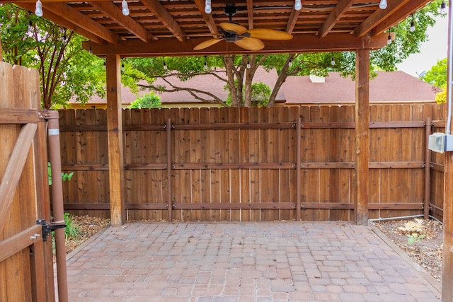 3705 Gemini Dr, San Angelo, TX 76903 - view of patio / terrace featuring fence and ceiling fan