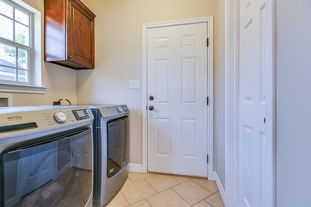 4333 Chisholm Trl, San Angelo, TX 76903 - laundry area with cabinet space, separate washer and dryer, light tile patterned floors, and baseboards