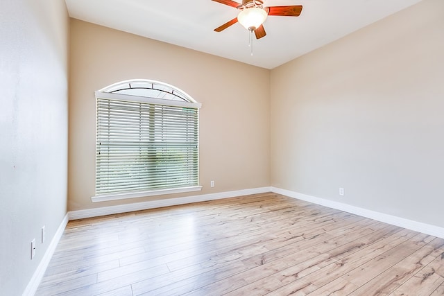 4333 Chisholm Trl, San Angelo, TX 76903 - unfurnished room featuring light wood finished floors, a ceiling fan, and baseboards