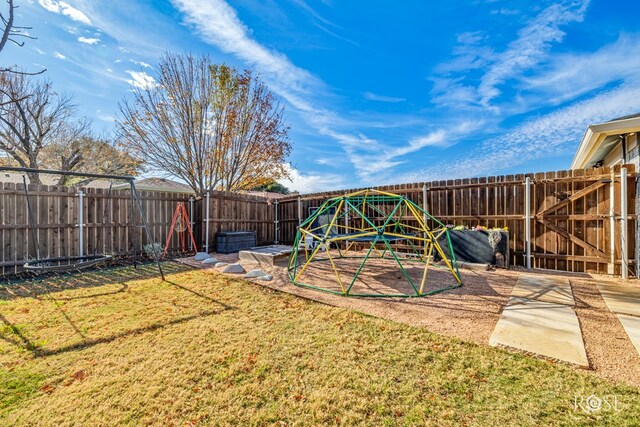 view of play area with a yard