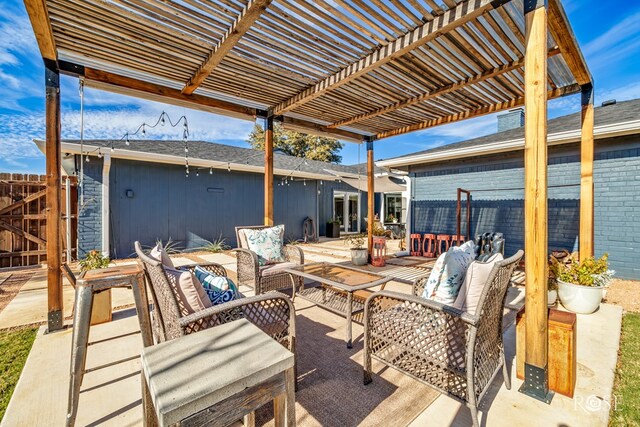 view of patio with an outdoor living space and a pergola