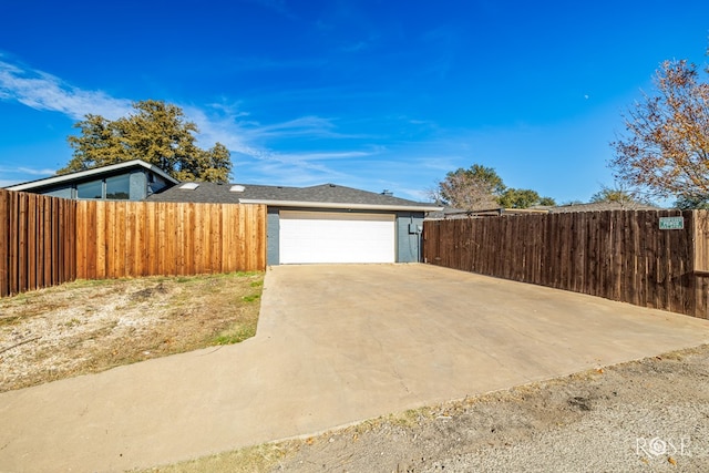 view of property exterior featuring a garage