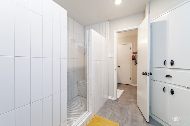 bathroom featuring tile walls and tile patterned flooring