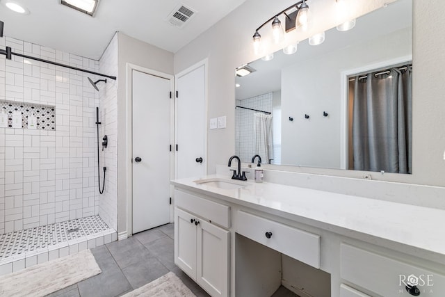 bathroom featuring vanity, tile patterned flooring, and a shower with curtain