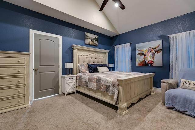 carpeted bedroom with vaulted ceiling with beams and ceiling fan