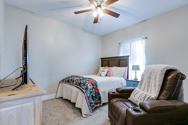 bedroom featuring ceiling fan and light carpet