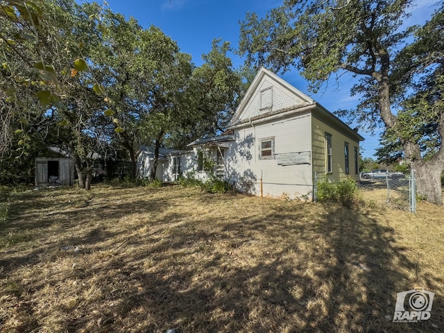 901 S Walnut St, Brady, TX 76825 - view of home's exterior with fence