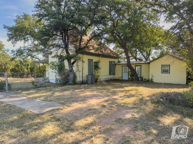 901 S Walnut St, Brady, TX 76825 - back of house with fence and central AC