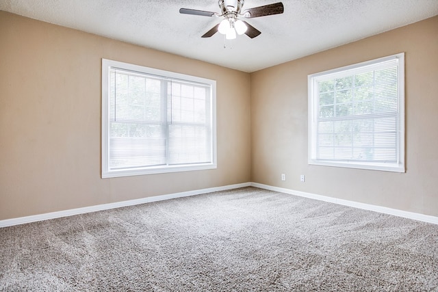 1619 Spaulding St, San Angelo, TX 76905 - carpeted spare room featuring a ceiling fan and a textured ceiling