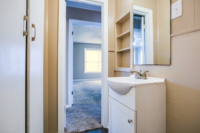 1619 Spaulding St, San Angelo, TX 76905 - bathroom with vanity and baseboards