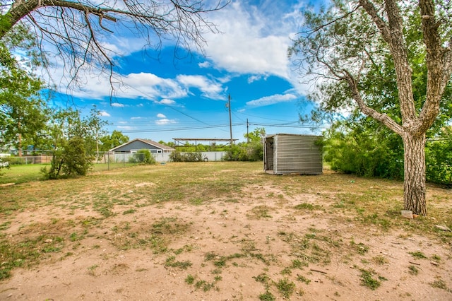 1619 Spaulding St, San Angelo, TX 76905 - view of yard with a storage unit