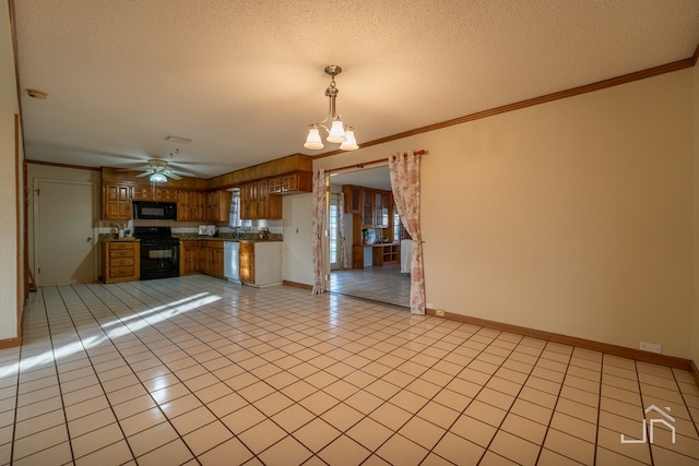 kitchen with crown molding, decorative light fixtures, a textured ceiling, and black appliances