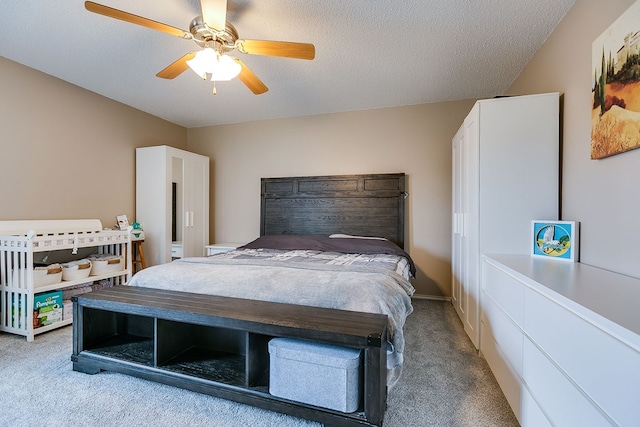 bedroom featuring ceiling fan and light carpet