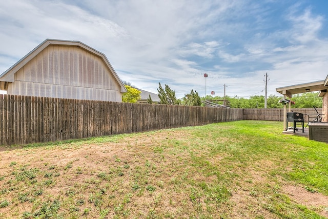view of yard featuring a fenced backyard