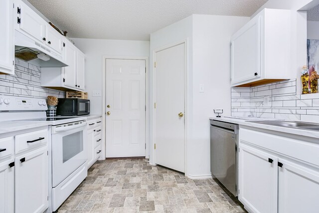 kitchen with stone finish floor, stainless steel dishwasher, black microwave, light countertops, and white electric range