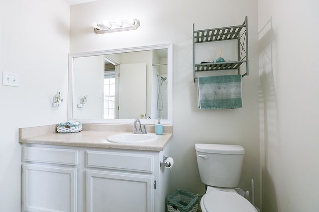 full bathroom with toilet, a shower, and vanity