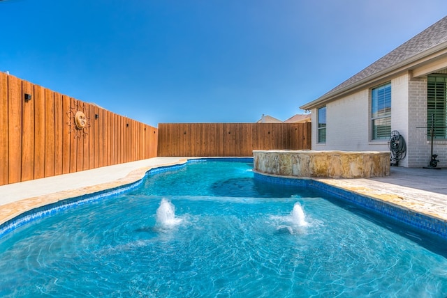 view of swimming pool with a fenced in pool, a patio, and a fenced backyard